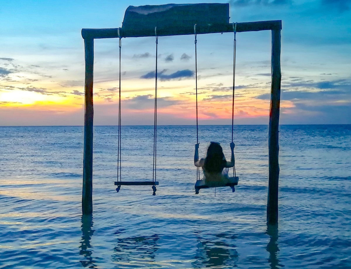 Qué ver en Holbox. Divisa el atardecer en un columpio sobre el mar Qué ver en Holbox. Divisa el atardecer en un columpio sobre el mar